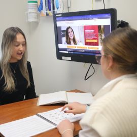 Speech Language Therapist working with patient