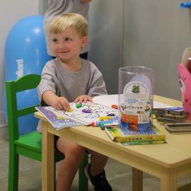 Young boy coloring