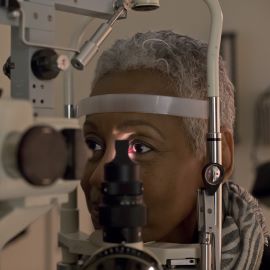 Woman having eye exam
