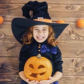 Girl dressed as witch for Halloween