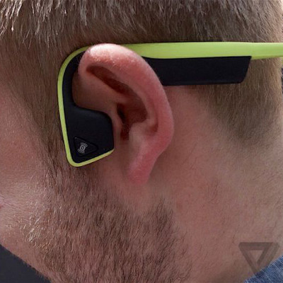 man wearing bone conduction headphones