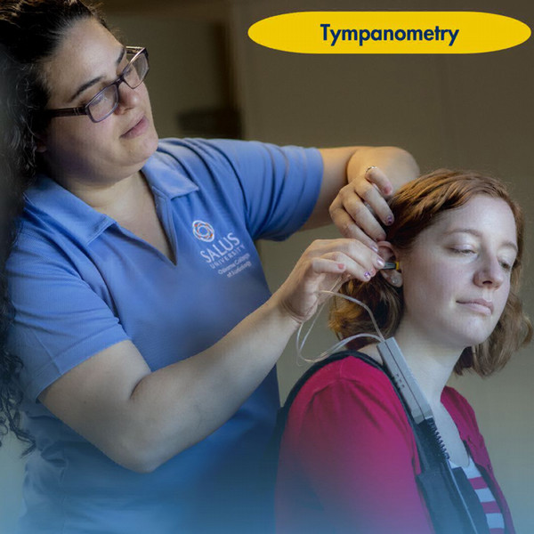 audiologist conducting hearing exam