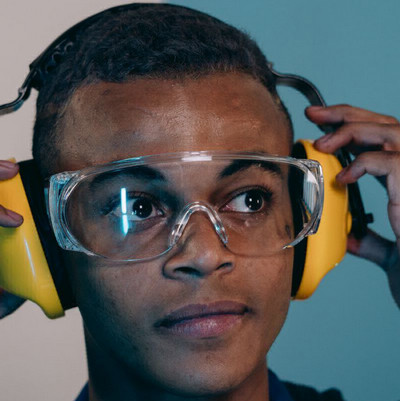 man wearing hearing protection headphoned