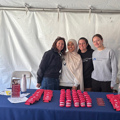 speech pathology students at community event
