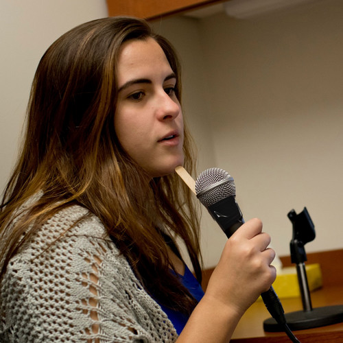client holding a microphone