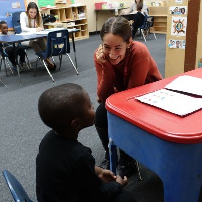 SLP student with child client thumbpic1