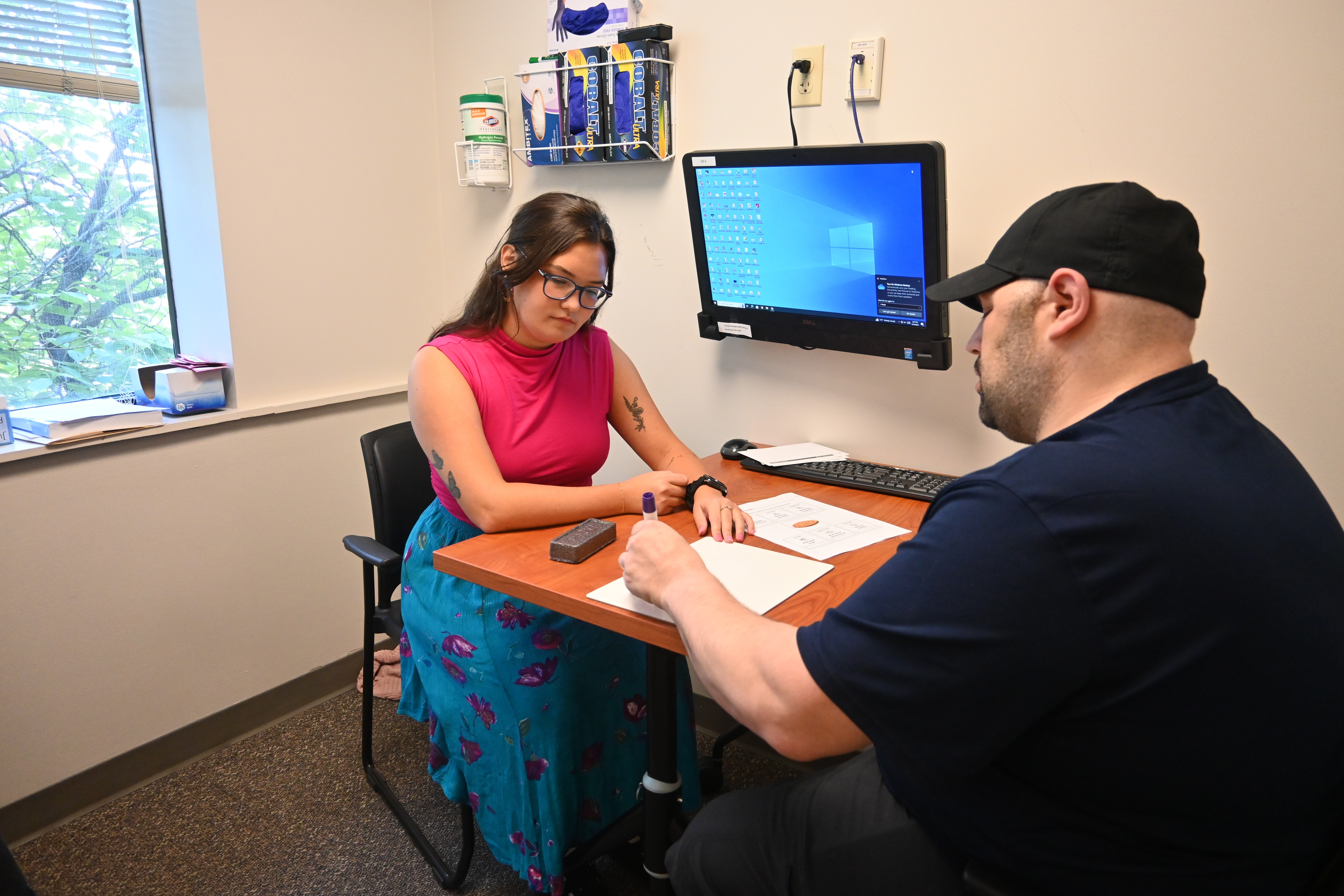 Student working with patient at SLI pic3