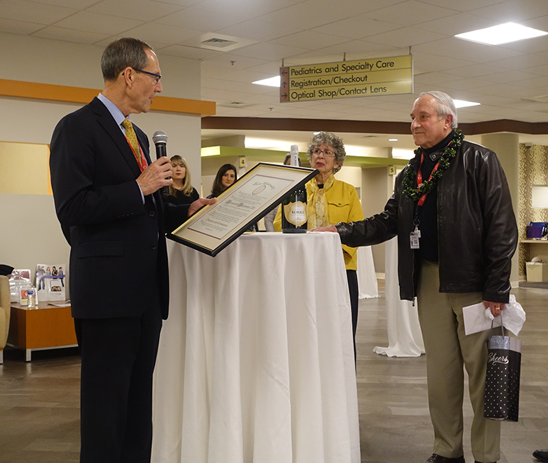dr. Mittelman presenting Dr. Blaustein with his plaque
