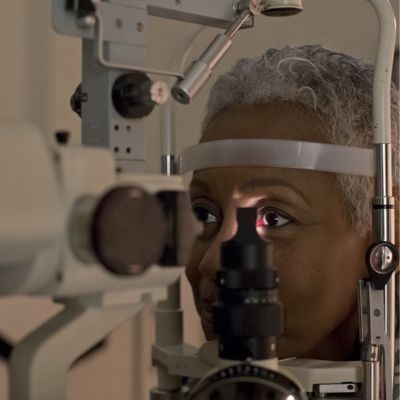 Closeup thumbpic of woman in eye lab