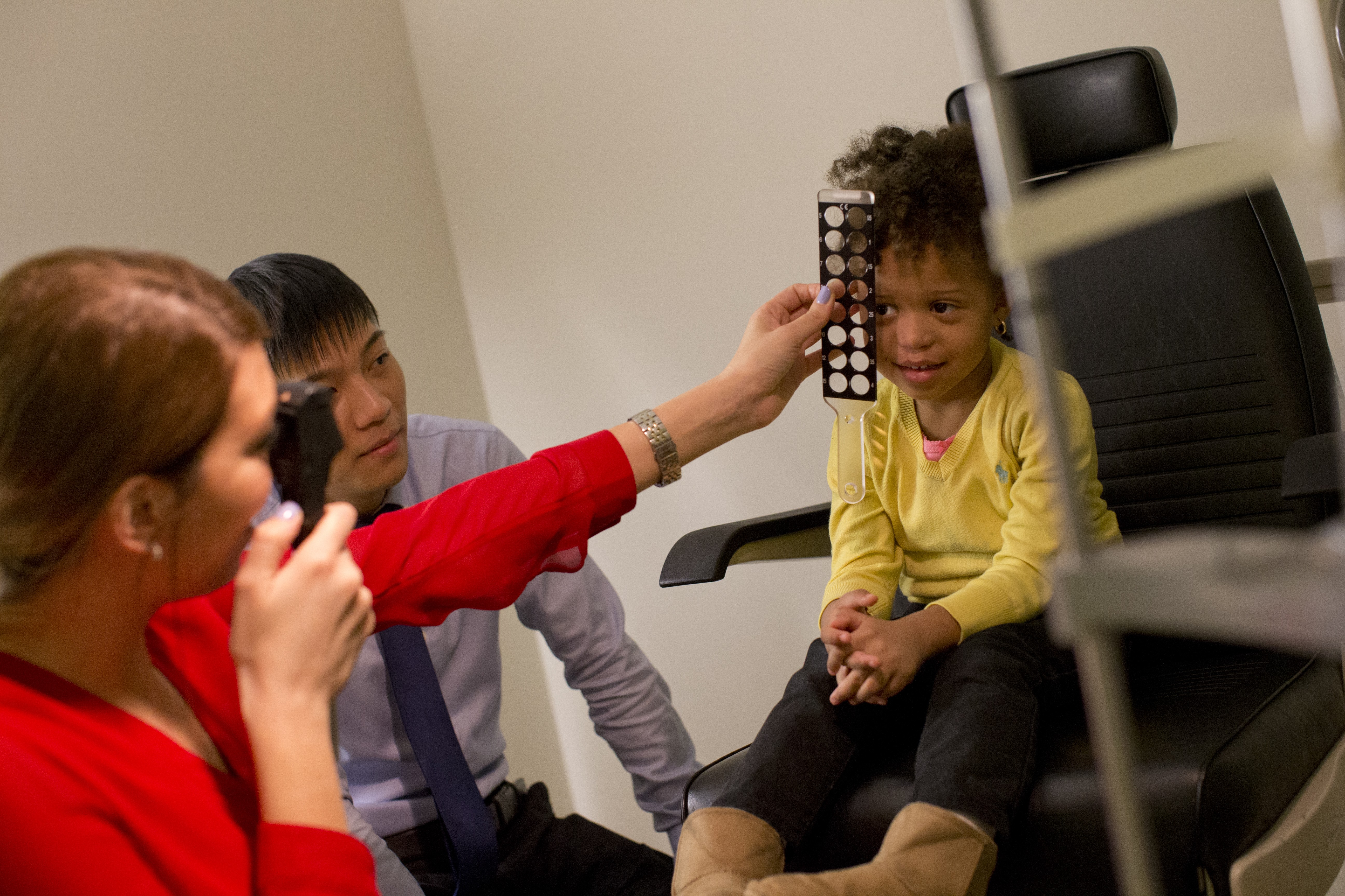 Child getting an eye exam at TEI