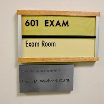Plaque outside Weisbond exam room thumb1