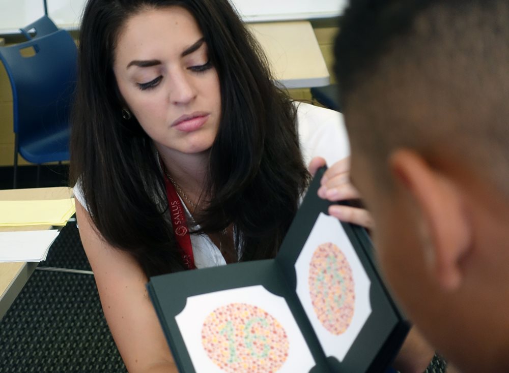 Patient being given a colorblindness test pic1A