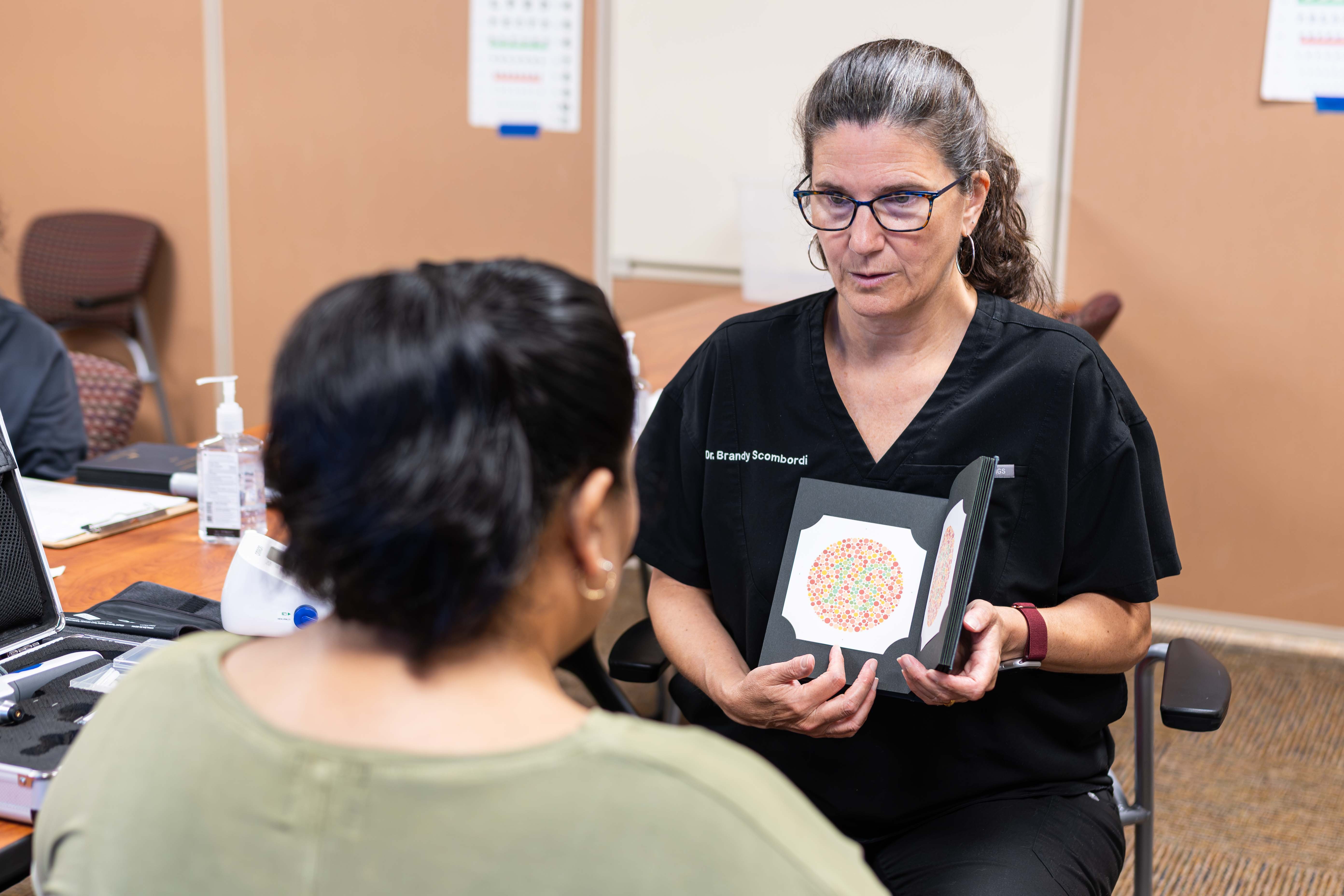 Dr. Scombordi-Raghu conducting an eye exam