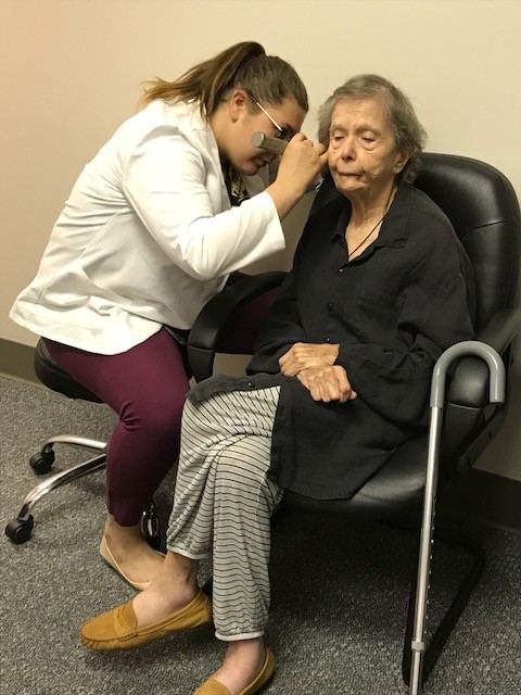 PEI student examines patient pic