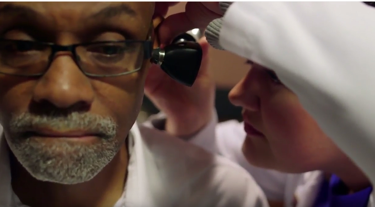 Elderly patient at PEI getting ears examined by audiologist