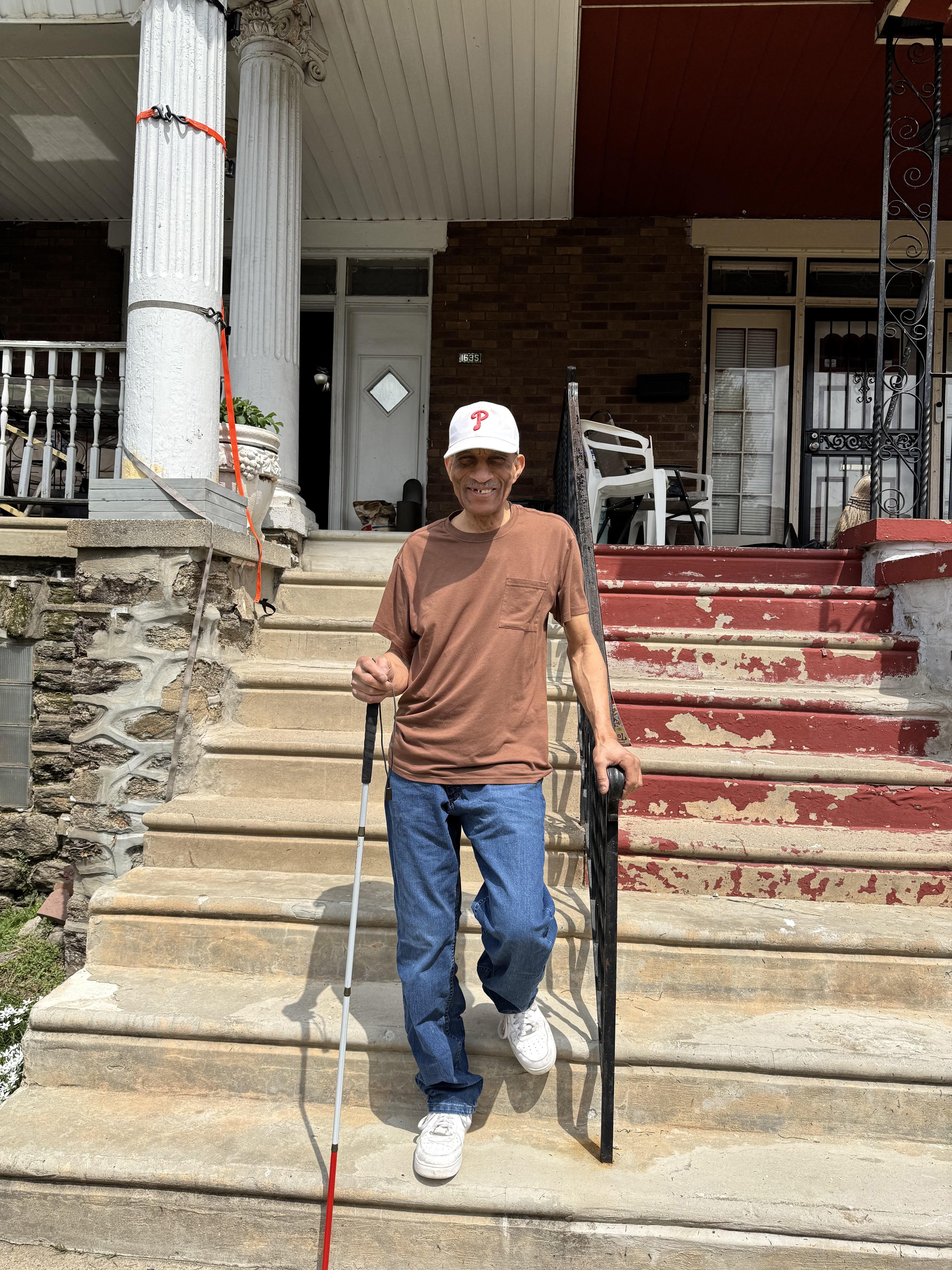 man using white cane