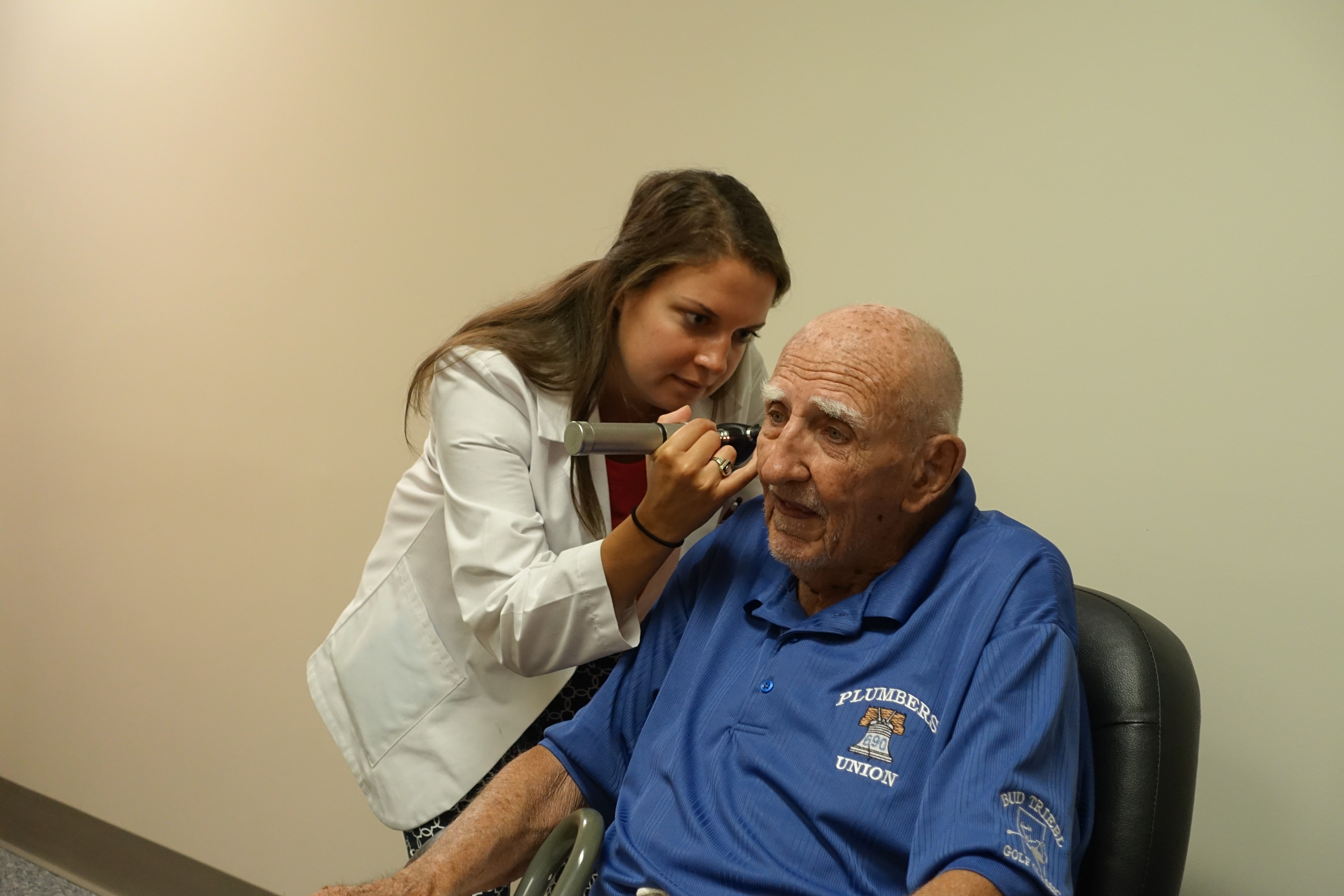 Patient having ear examined at PEI