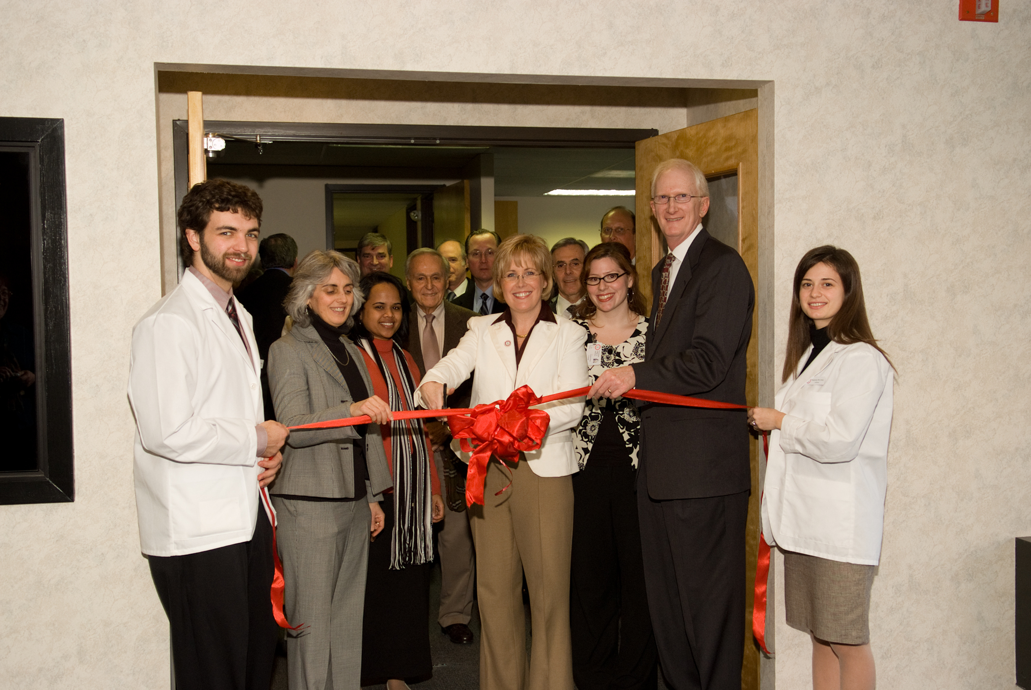 Cutting the ribbon at PEI's opening in 2004