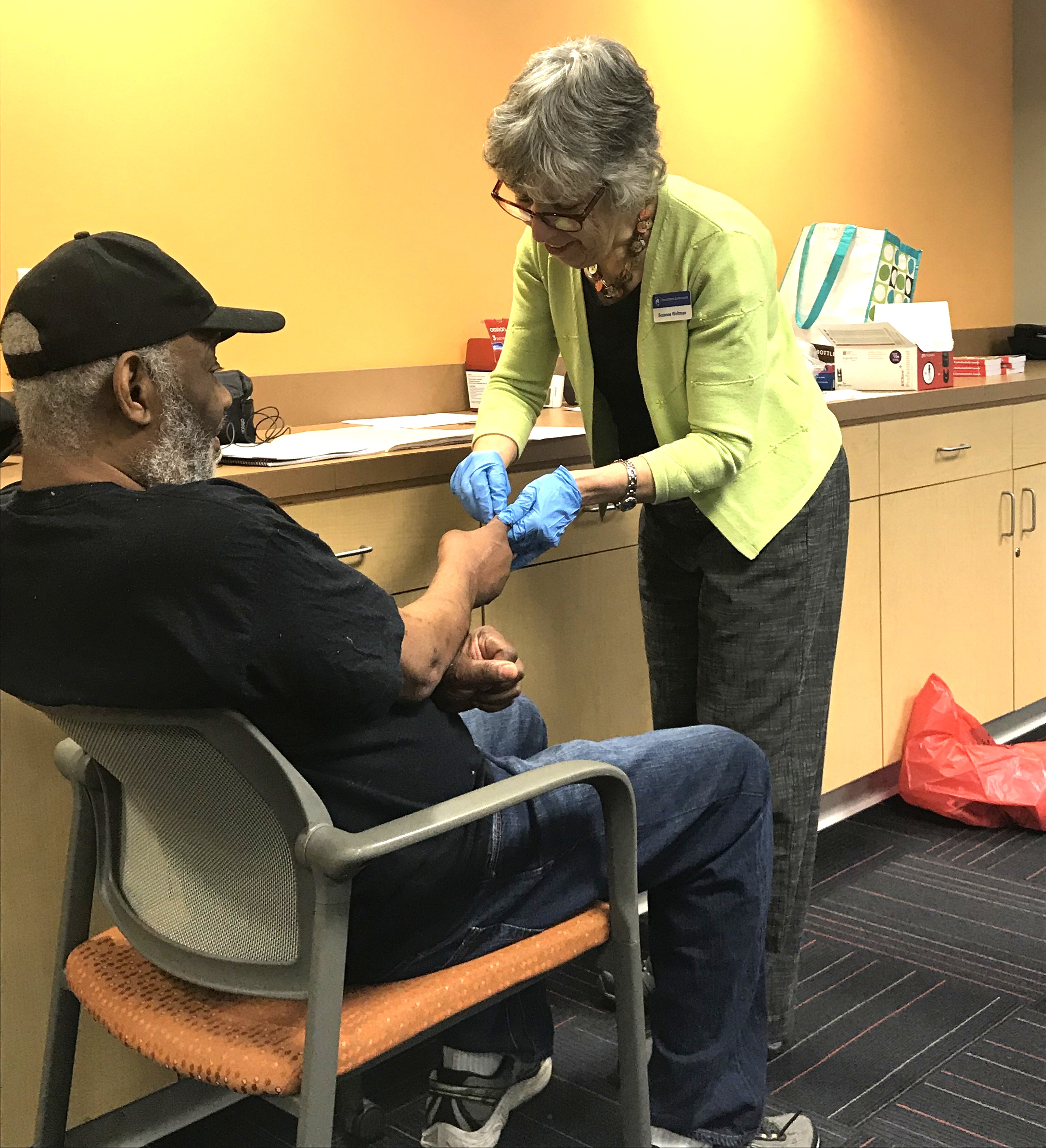 Patient gets blood sugar tested at Real World Diabetes