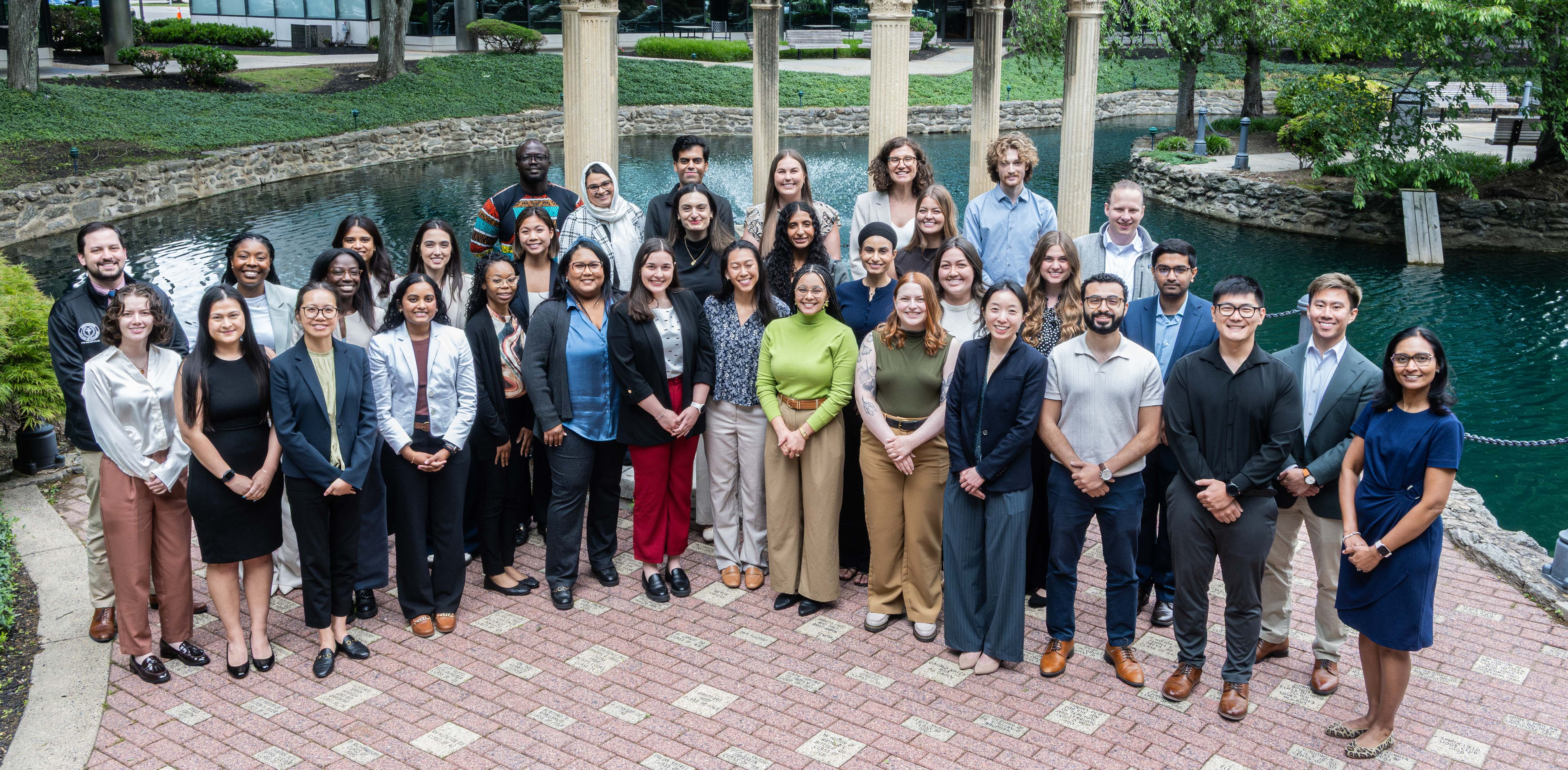 Residents group photo in front of the gazebo