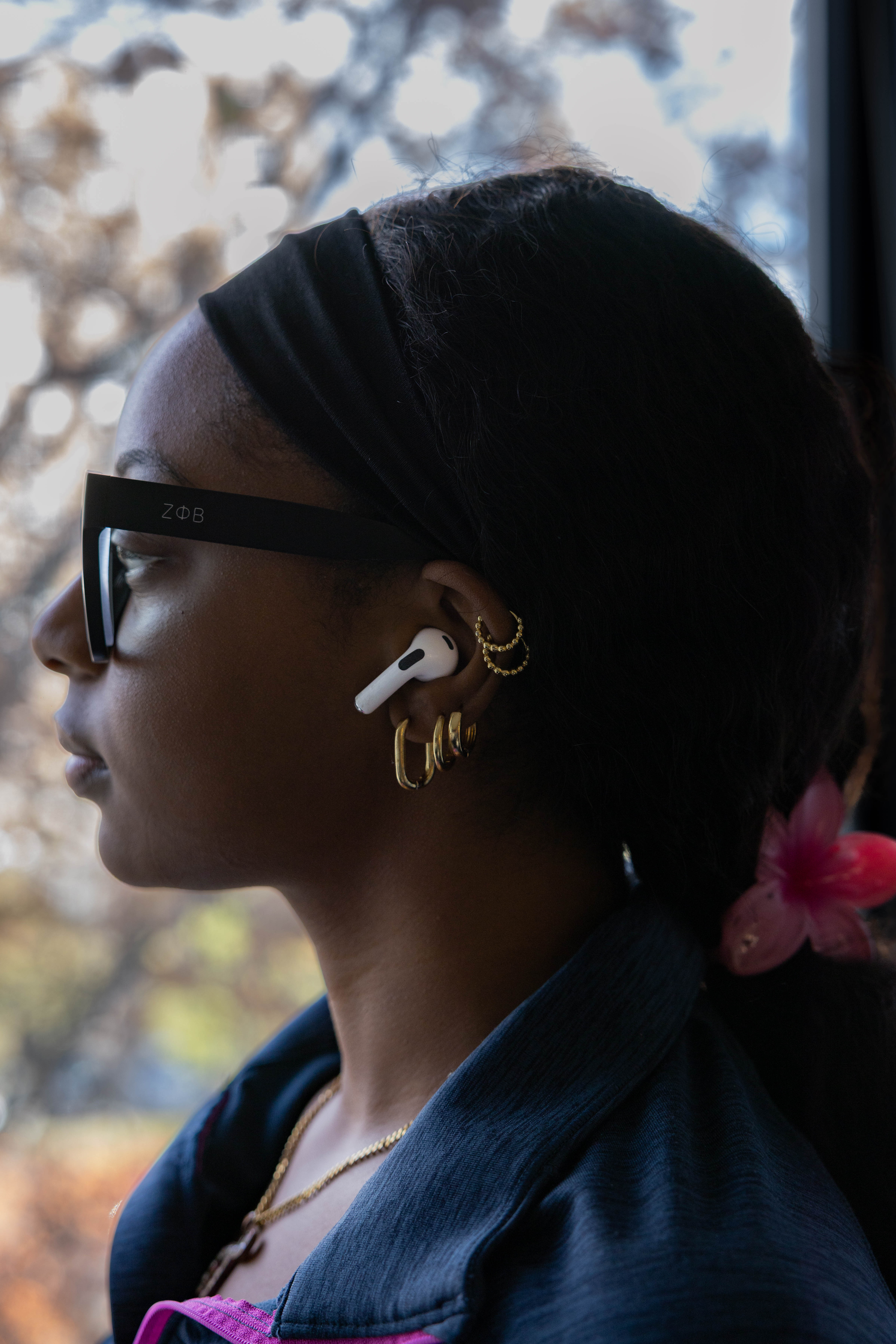 Students with earbuds listening to music