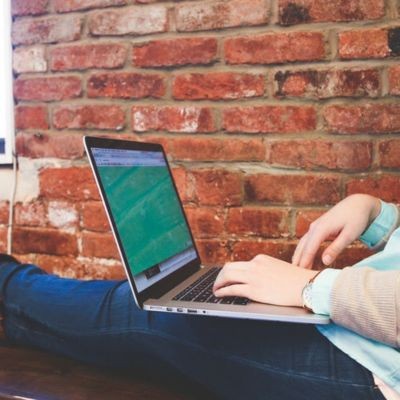 Student relaxing in front of a computer thumbnail