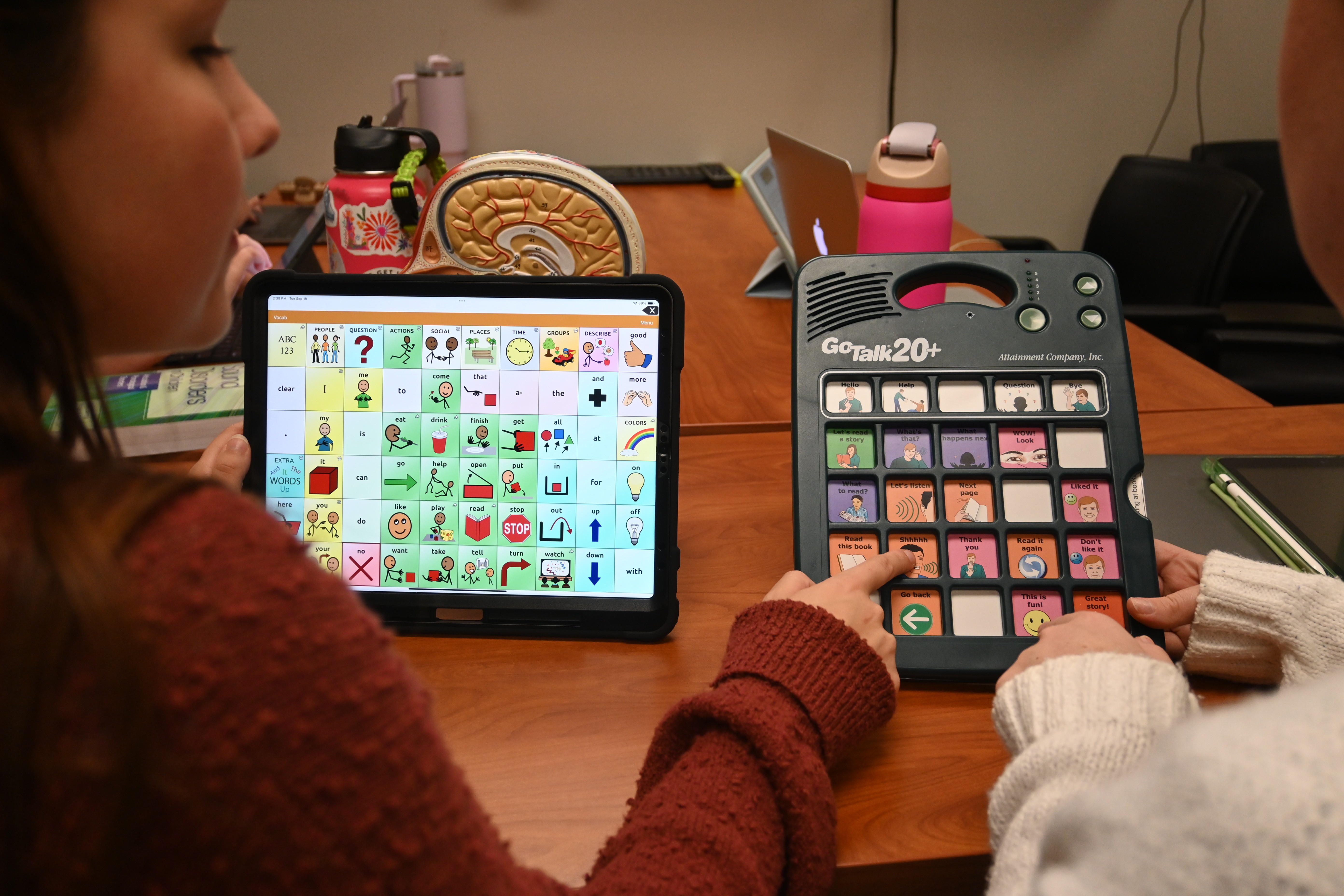 Child working on communication devices