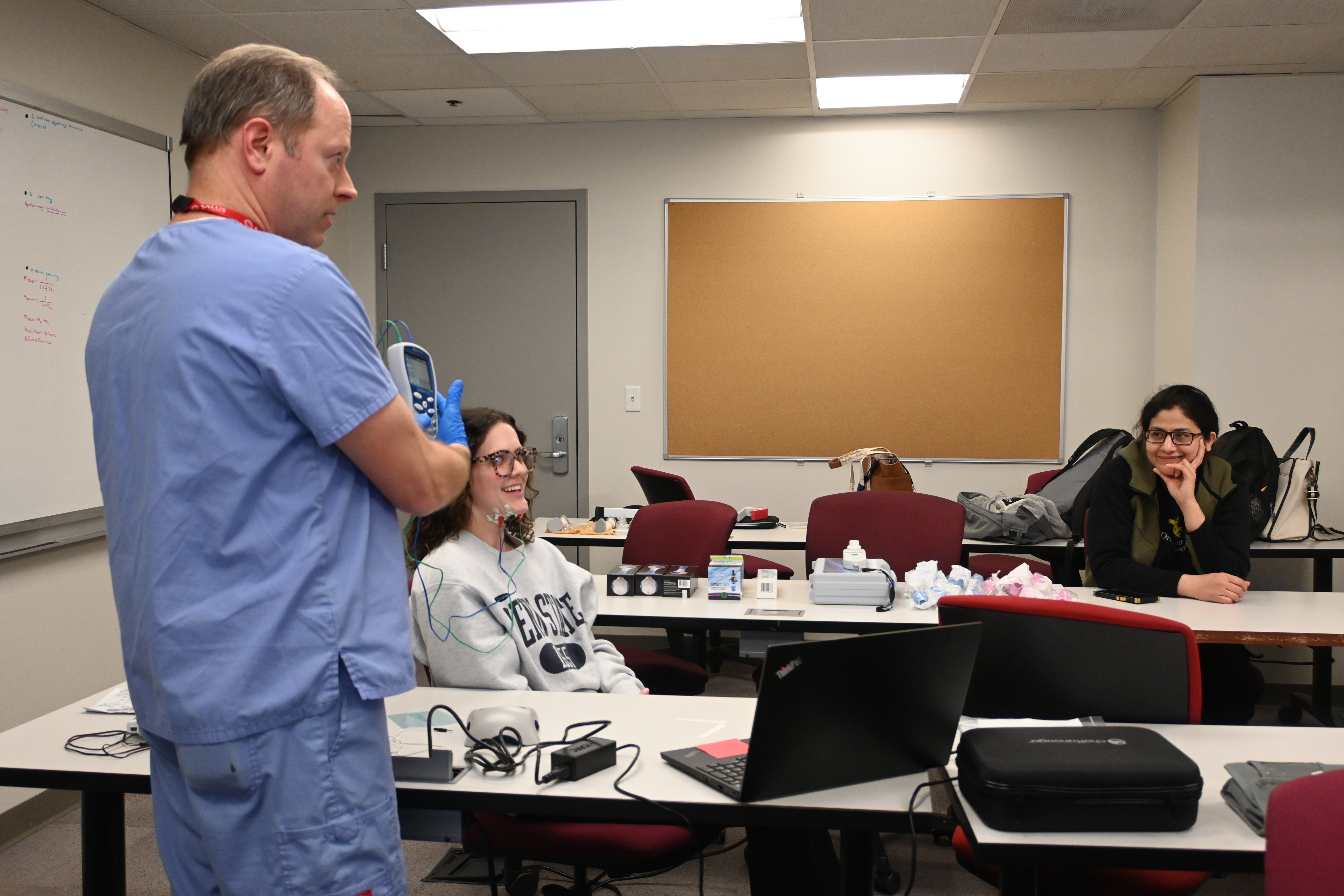 SLP students in lab with professor pic1