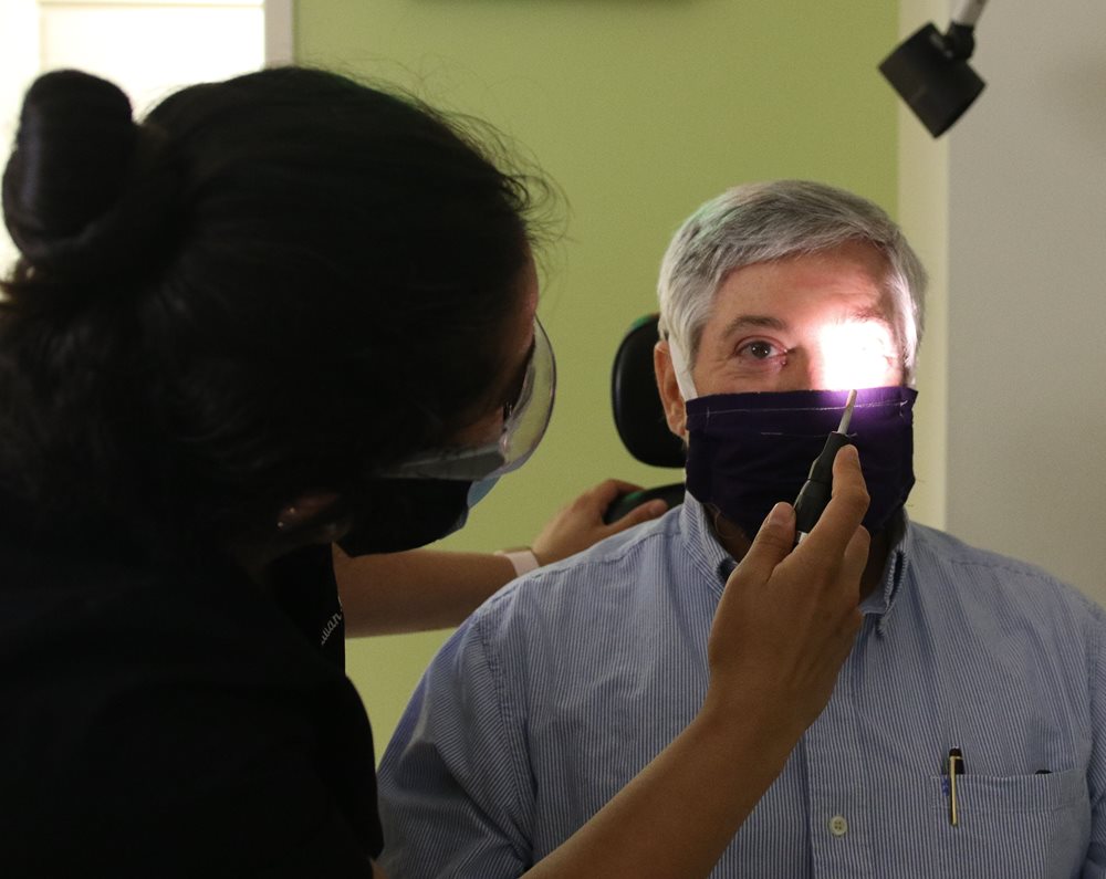 Patient being examined for pink eye pic
