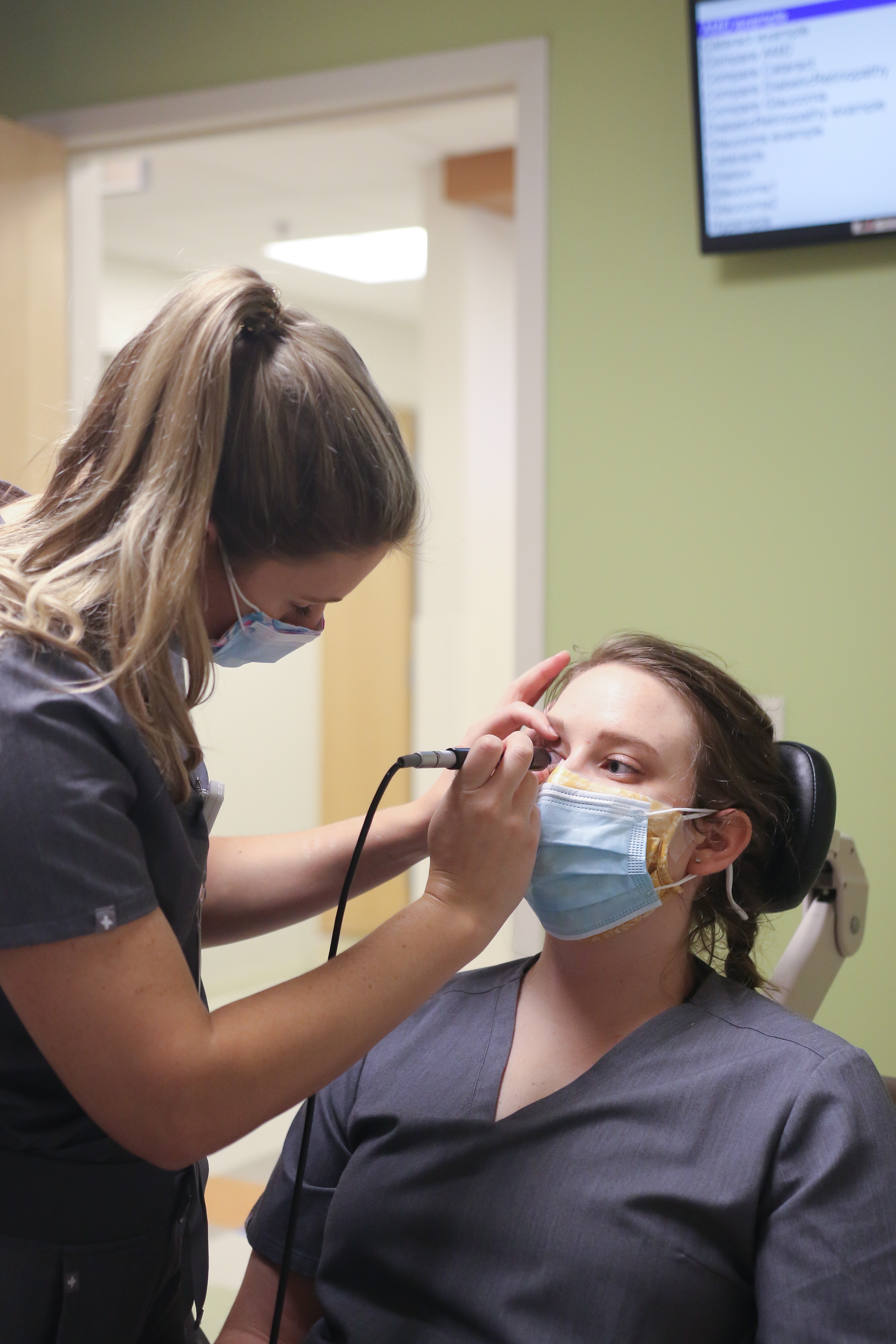 Two TEI students in the exam room