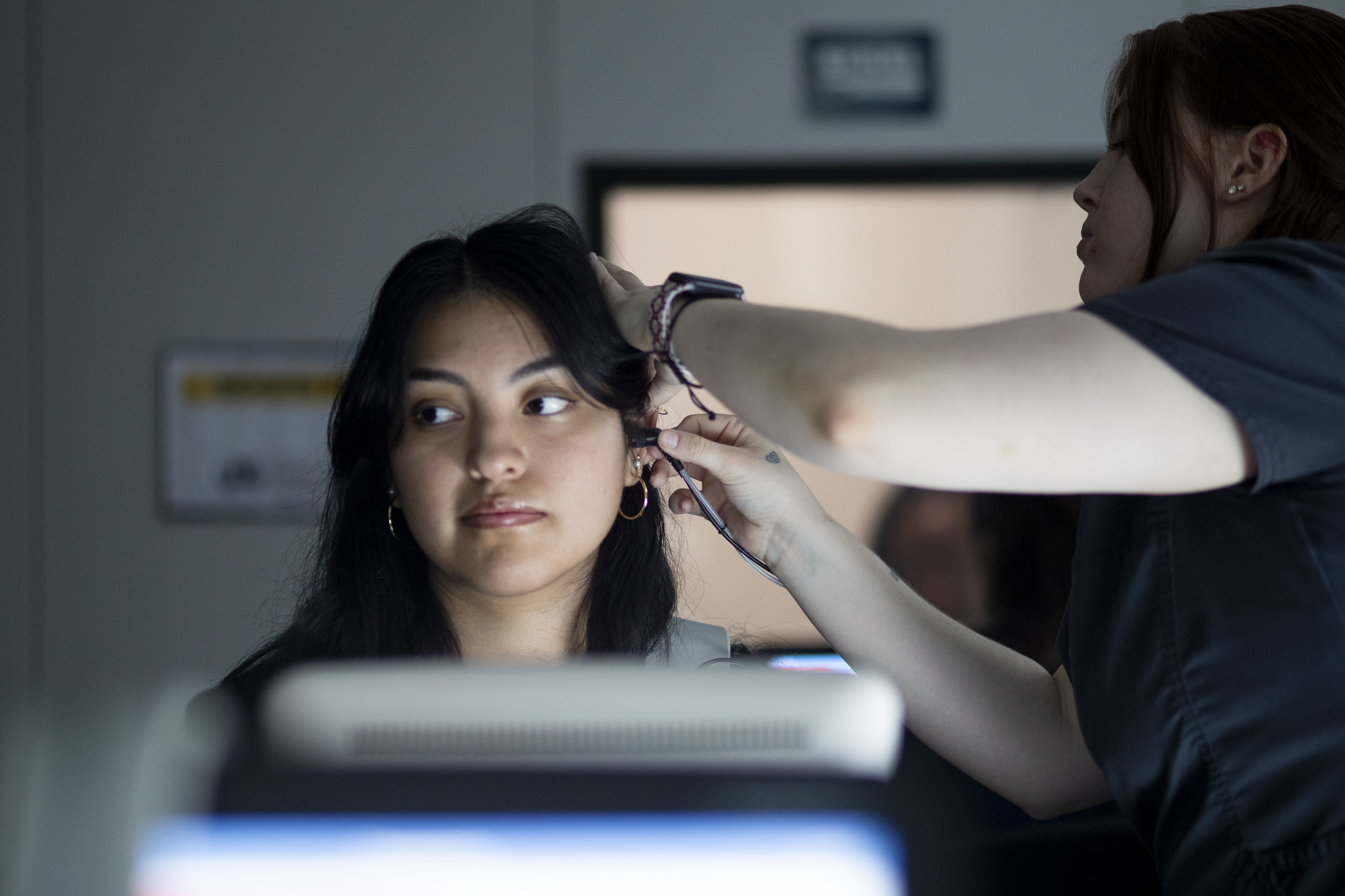 Patient getting ears tested in the lab pic1