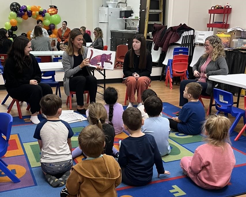 SLPs reading to toddlers