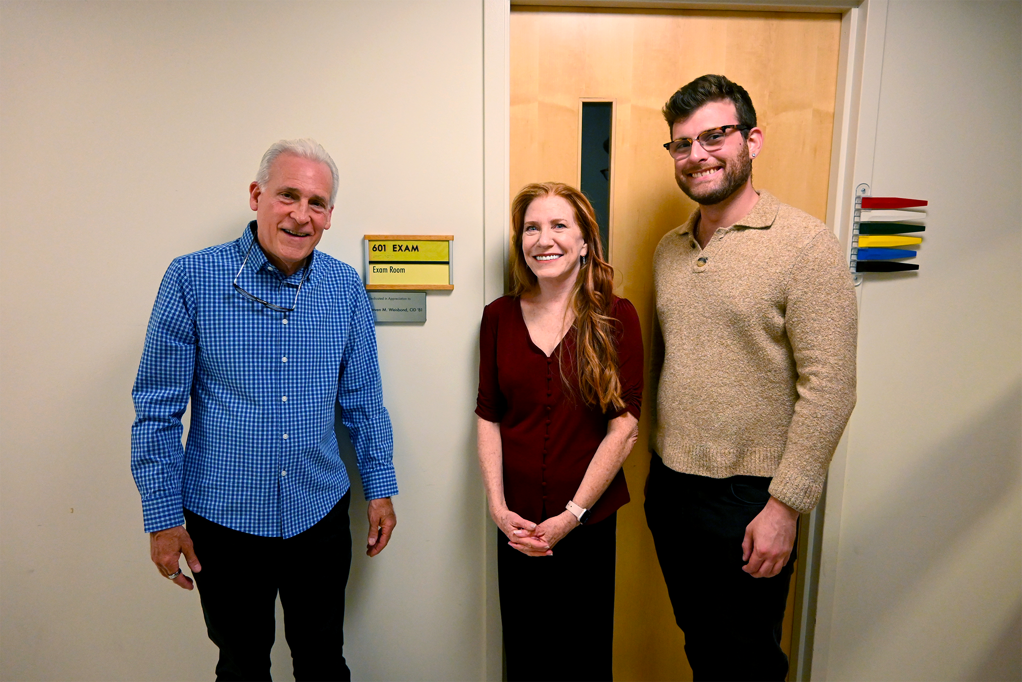 Weisbond family outside exam room pic1